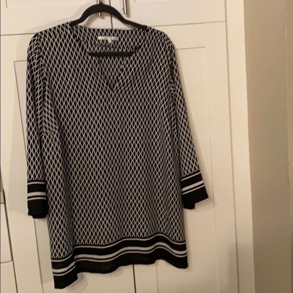 Black/white tunic.  V-neck and sheer fabric.